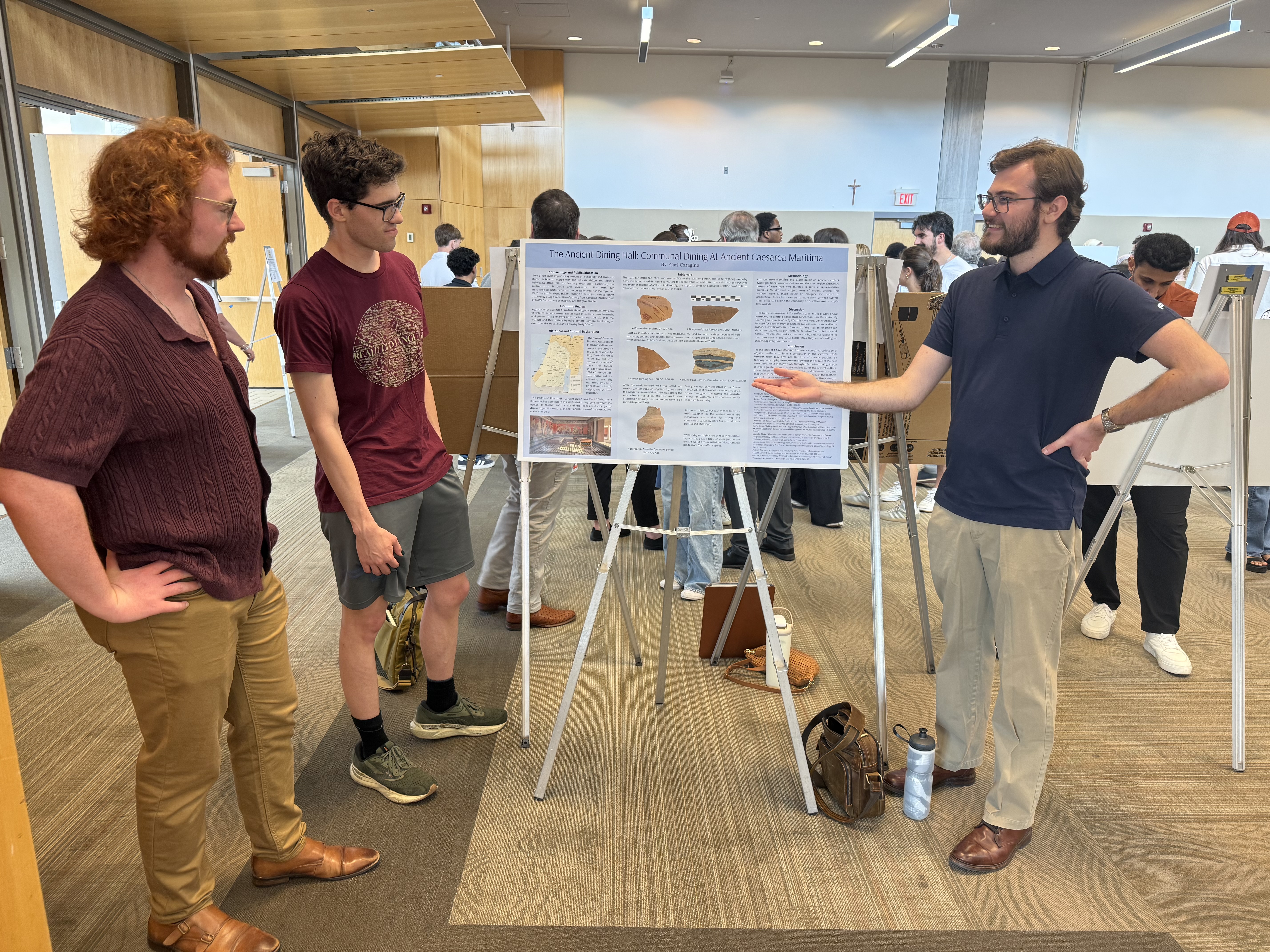 Mr. Carl Caragine presents his research to fellow Ancient and Medieval Department seniors Mr. Jack Riley and Mr. Nathaniel Erb.
