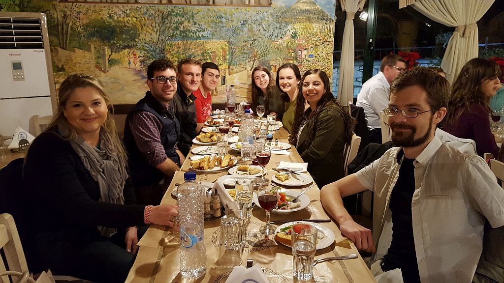 Students at dinner in a taverna, Athens